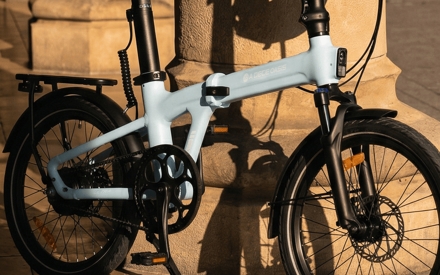 ADO Air 20 Ultra 2026 folding e-bike in urban commuting setting with integrated lights and compact foldable design