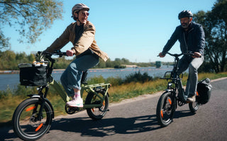 Older rider enjoying a comfortable e-bike ride on a UK cycling path.