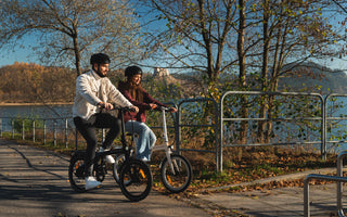 Electric bike commuter riding in a UK city street during daily travel.