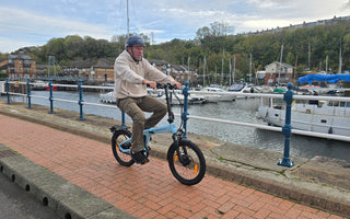 Illustration of safe e-bike riding practices and gear tips to avoid common UK e-bike crash risks including braking control and balanced riding posture.