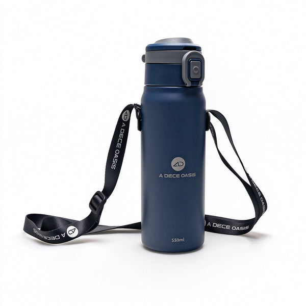 Rear view of the dark blue ADO insulated bottle showing the integrated AQS Mag quick-release interface and the black adjustable carry strap.Dark blue